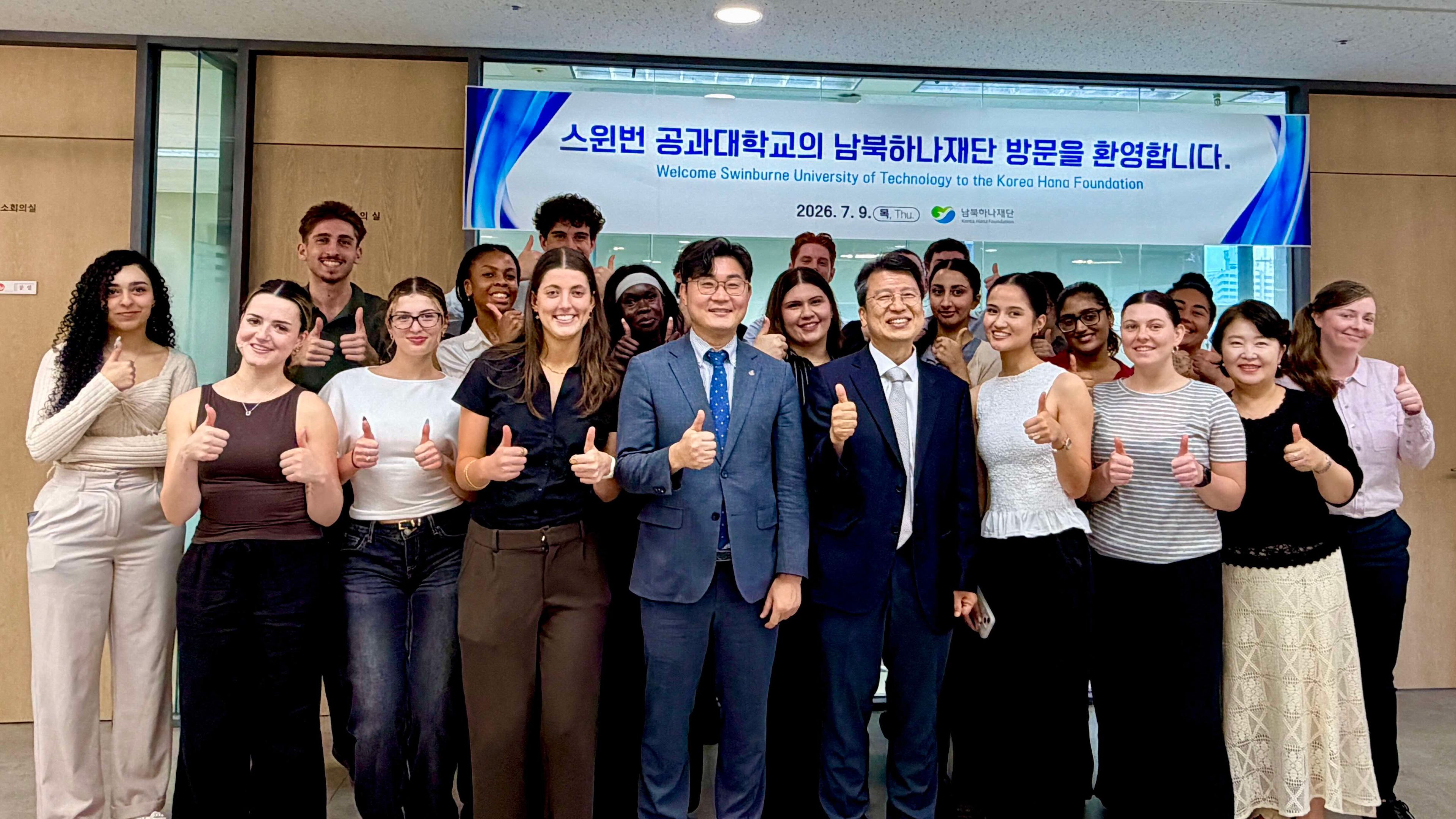 students and staff posing at Hana Foundation