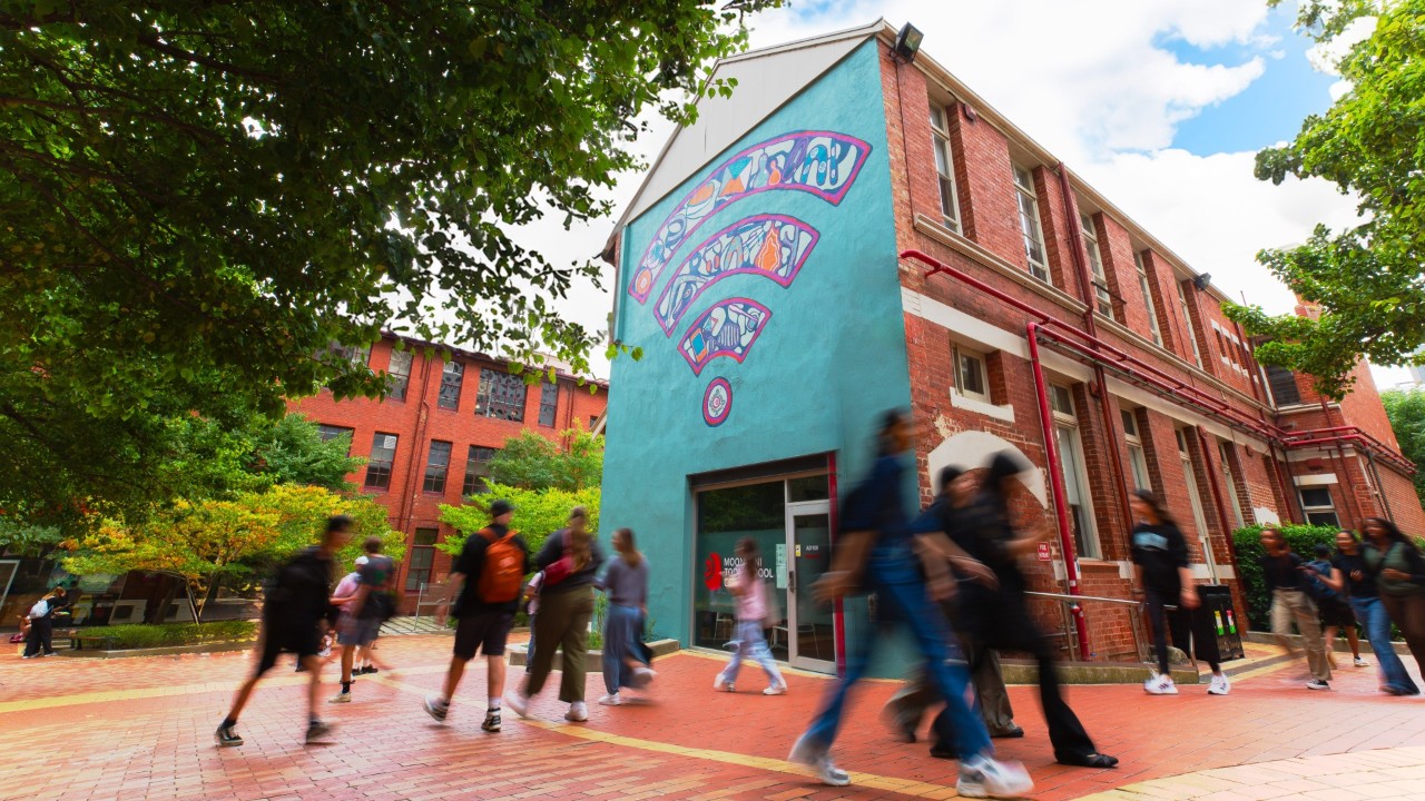Students walking past the Moondani Toombadool Centre building on Swinburne's Hawthorn campus.
