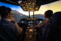 an image of Swinburne students using the Aviation Simulation lab