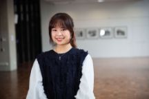 International student Lareina facing the camera and smiling.