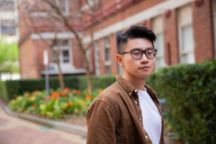 International student Duc from Vietnam on Hawthorn campus faces the camera smiling