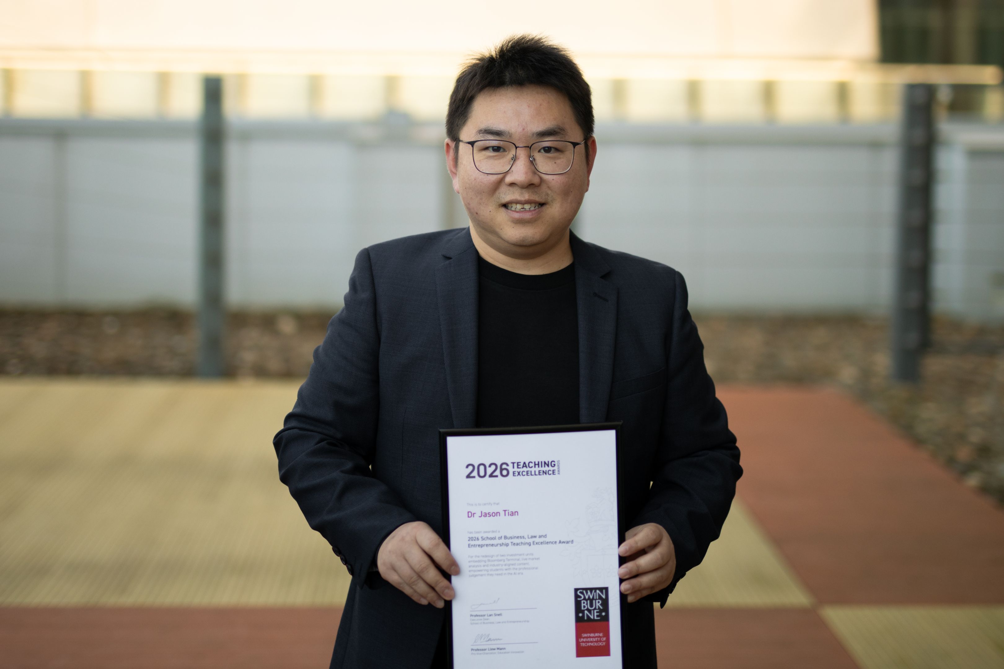 2026 School Teaching Excellence Award recipeitn Dr Jason Tian with his certificate