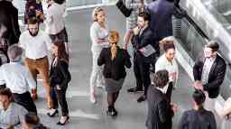 University alumni engaging at a networking conference event.