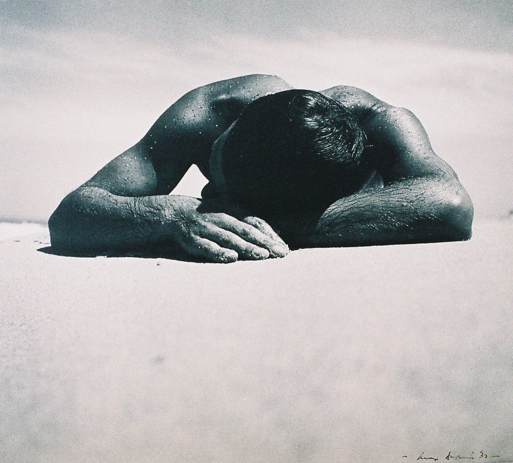 Photograph of a man sunbaking