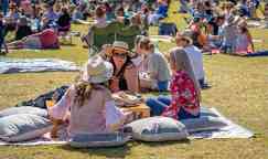 Girlfriends Enjoying Outdoors At Food Festival