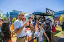 Students attend an event on campus for o-week 