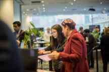 A student gets career advice from the student services team