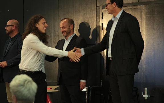David Coltman overseeing a graduation at Richmond Football Club. 