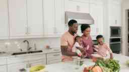 Family keeping fruits and vegetables fresh in the kitchen