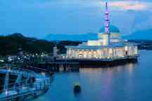 Night view of Kuching city waterfront, Sarawak river pedestrian bridge