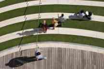 Aerial view of the courtyard outside the ATC with some students walking and sitting. 