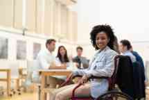 Wheelchair Leadership Businesswoman Portrait at Business Meeting