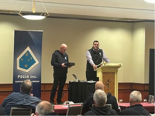 Mark Taggart receiving his award for the Victorian Gas Industry Teacher of the Year by Energy Safe Victoria (ESV)