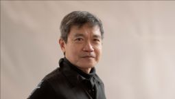 Headshot of Calson Chua inside looking at the camera 