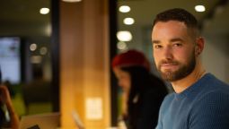 A student using a laptop in StudentHQ