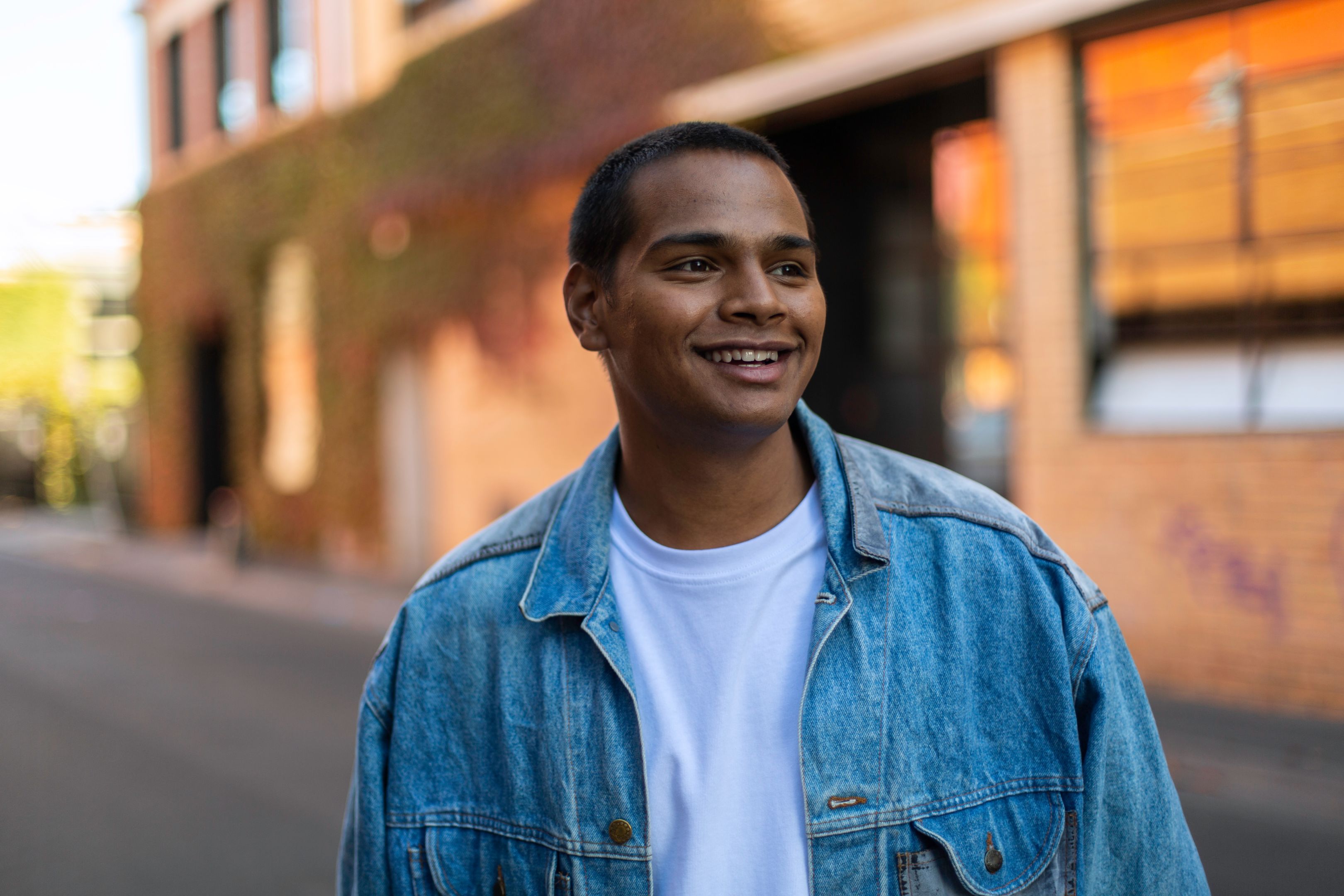 Guy looking off camera, as if into his bright future.