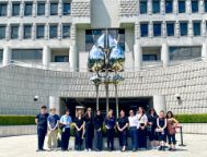 Law students standing in a line outside the Supreme Court of Korea