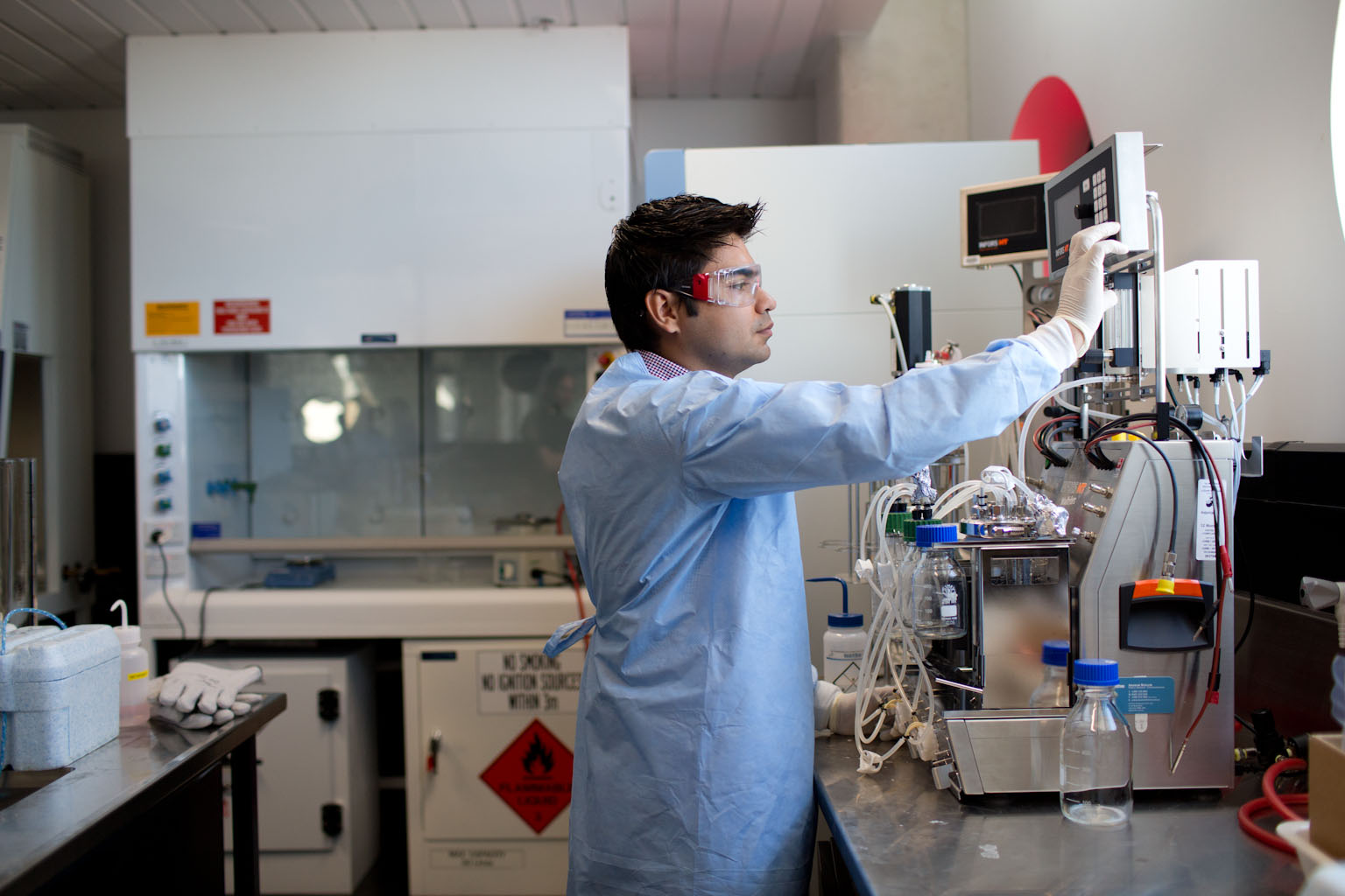 Student in a laboratory working on a medical machine