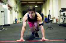 Male student prepares to do a sprint test within a laboratory