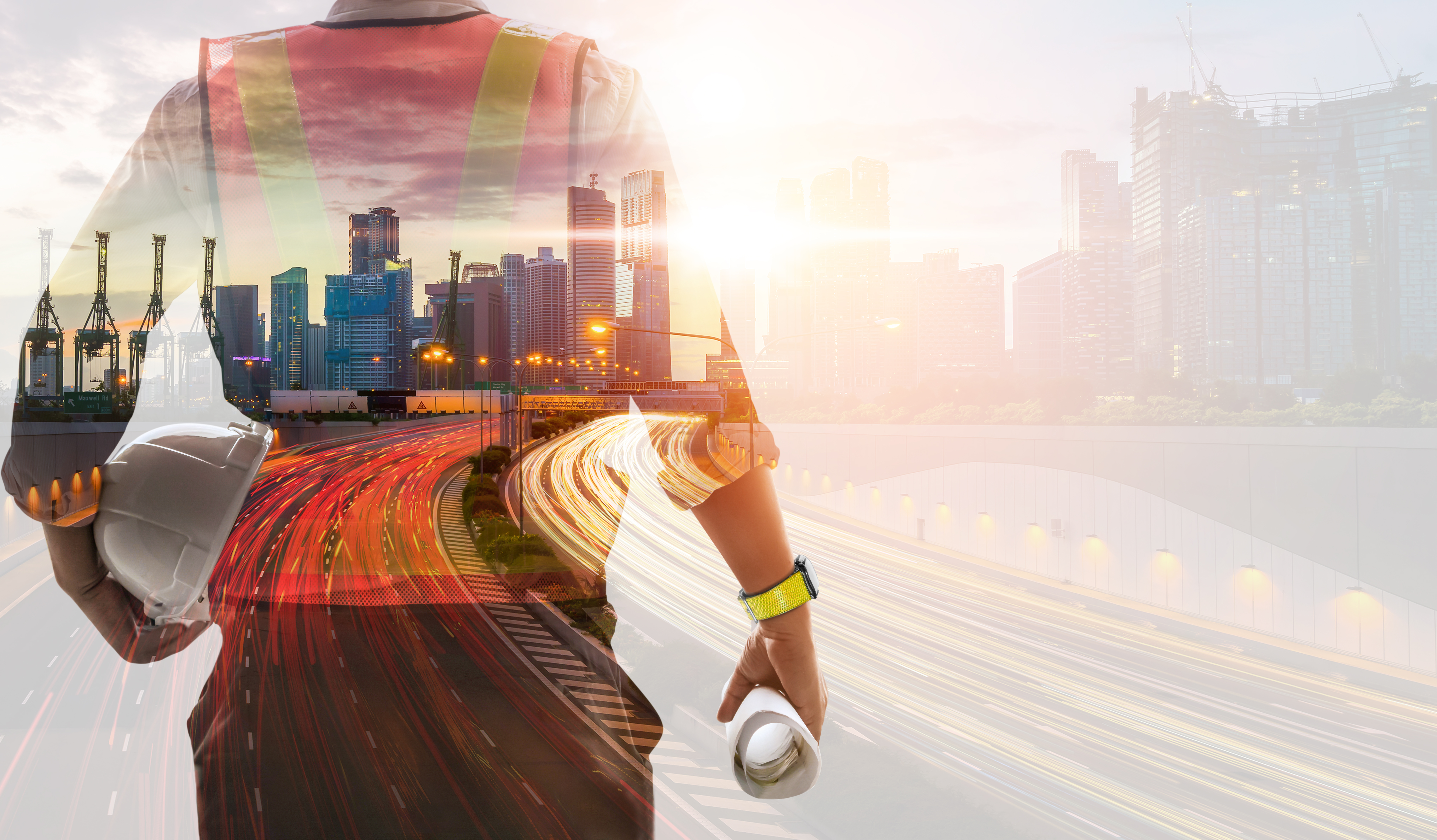 City skyline in the background with a half transparent man in high vis over the top.